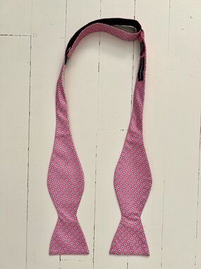 Saddlebred Pink Self-Tie Bow Tie with White and Navy Dot Motif